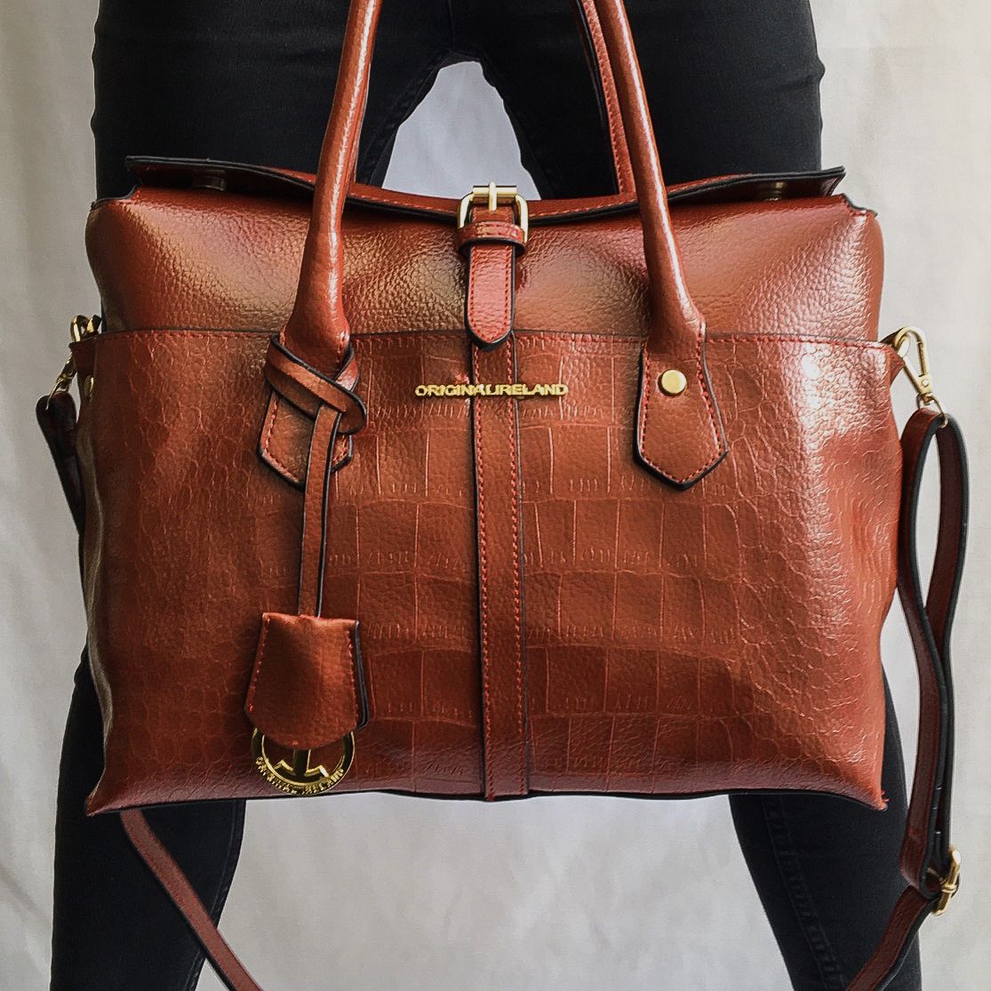 tan leather bag        <h3 class=